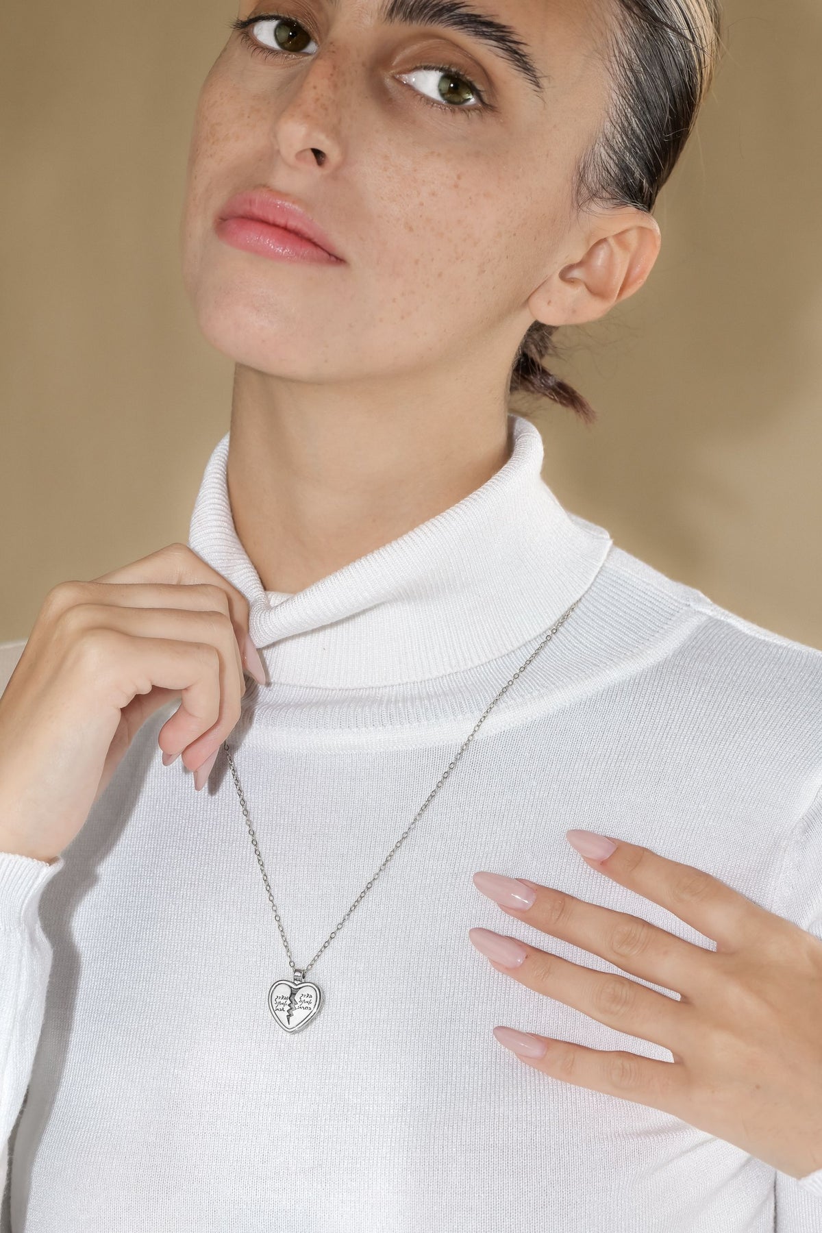 Hostage’s ‘Heart of Faith’ Necklace made from Rockets