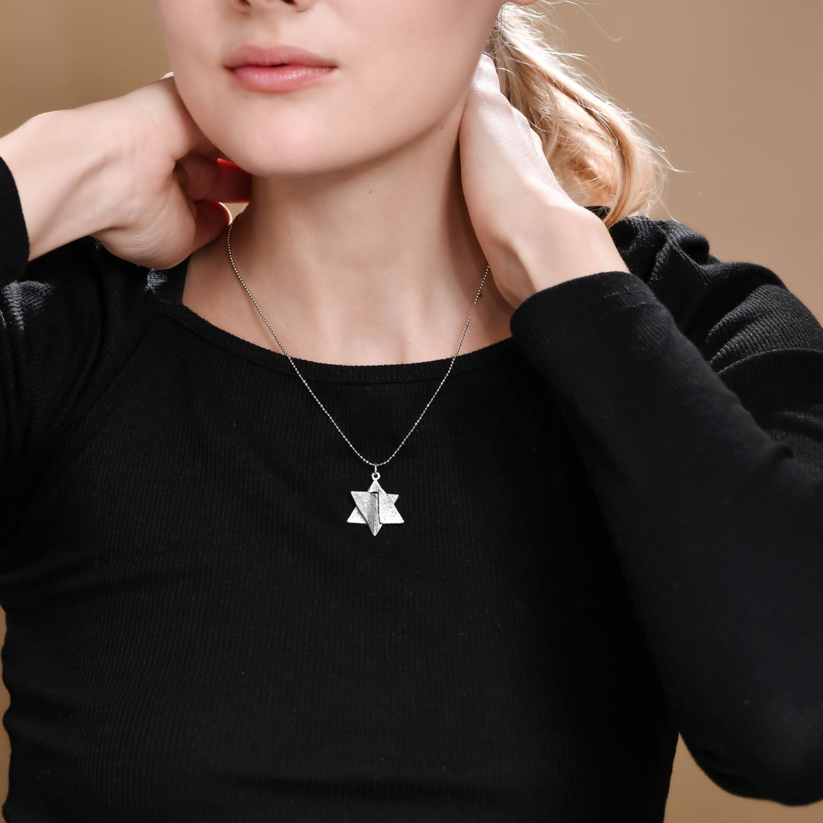 Star of David ‘Explosion’ Necklace made from Rockets and Iron Dome